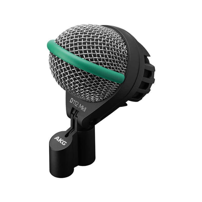 Angled perspective of the AKG D112 MKII microphone showing its grille, mount, and green band.