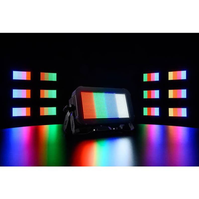 Multiple Stairville Wild Wash Pro 648 RGBW LED lights illuminating a stage setup with bright red, green, and blue beams.