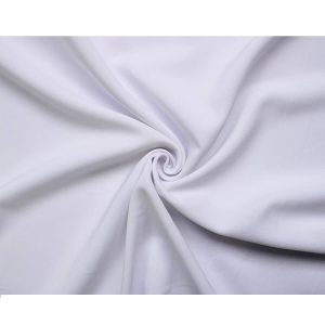 Close-up of white event drape fabric showing smooth texture and spiral folds
